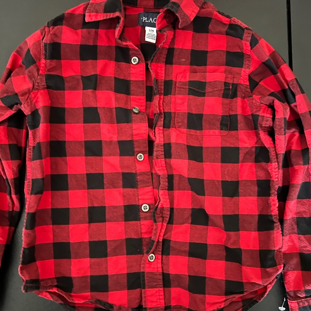 Lot of 4 shirts. 3 long sleeve and 2 shirts sleeve.